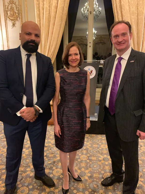 Hassan Saradipour with the U.S. Ambassador to France and another guest at a reception
